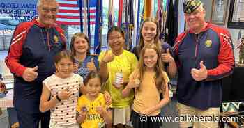 Girls donate lemonade stand proceeds to Northbrook Veterans Center