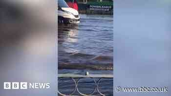 Vehicles driven through flood in Birmingham after water main bursts