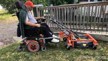 High school students' technology helps this man who uses a wheelchair mow his lawn again