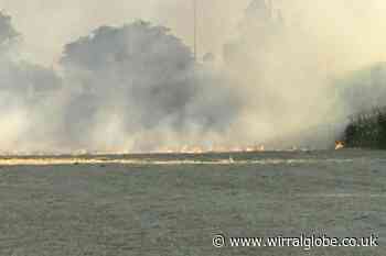 Road closed due to smoke during 'grass fire' in Ellesmere Port