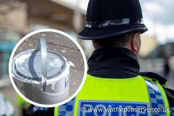 Vandal poured paint over Watford vehicles overnight