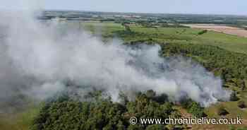 Wildfire 'size of five football pitches' still burning at nature reserve near Newcastle Airport
