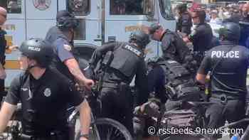 Officer undergoes surgery to save leg after he was hit by firetruck during Nuggets parade