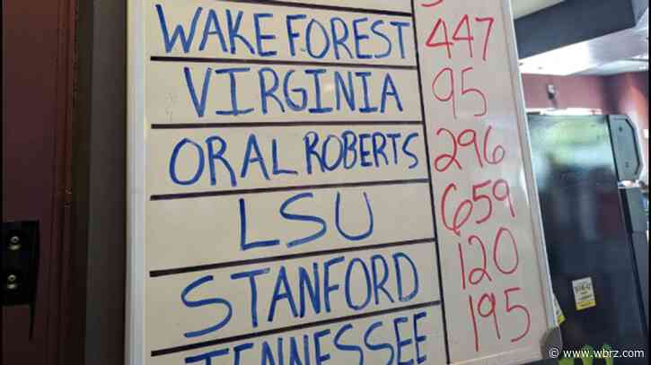 Visiting LSU fans dominating Omaha bar's CWS drinking challenge