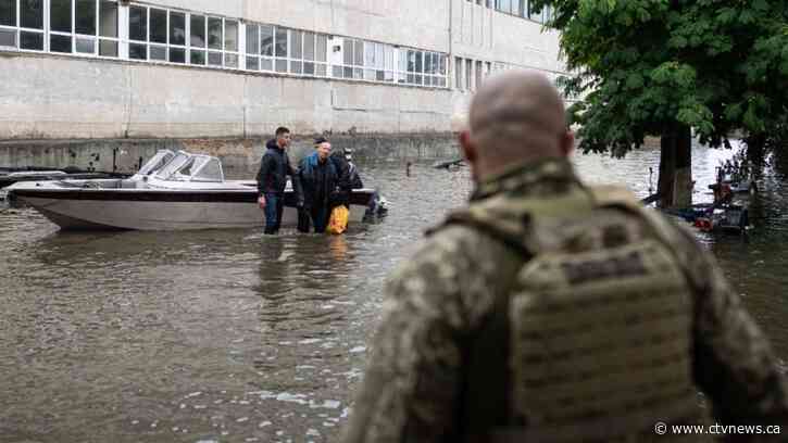 Rescuers are braving snipers and racing time to ferry Ukrainians out of Russian-occupied flood zones