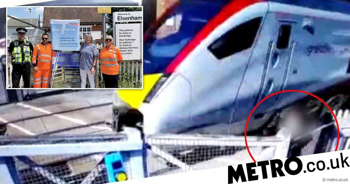 Woman two seconds away from being hit by train at level crossing - UK ...