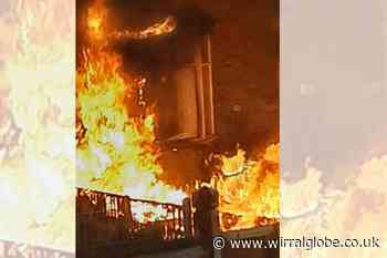 Man charged on suspicion of arson after fire rips through Birkenhead