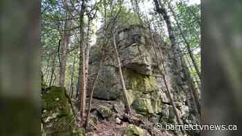 Rock climber trapped on huge boulder