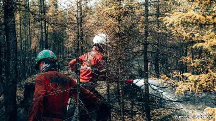 Most residents of northern Quebec town return after wildfire threat, but risks remain