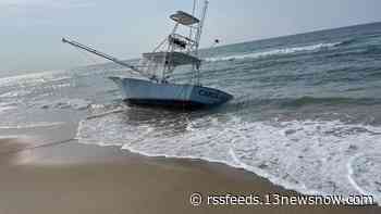 Boat grounded on beach along Cape Hatteras National Seashore