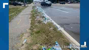 Kitty Hawk highway temporarily backed up after 25 cases of water bottles are dumped on the highway