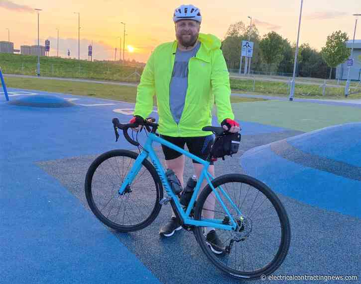 Frankie prepares to cycle for the Electrical Industries Charity