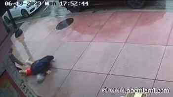 Surveillance shows man collapsing after shooter opens fire outside bakery on Collins Ave