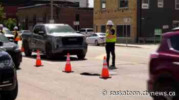 Sinkhole opens in downtown Saskatoon street