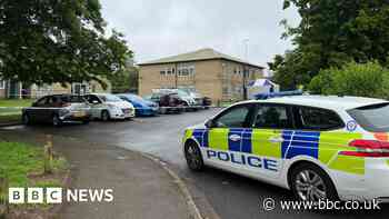 Woman and boy, 16, arrested after man's body found at Coventry flat