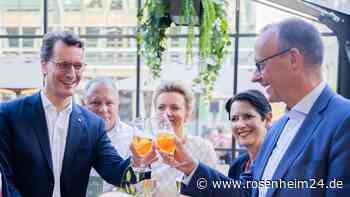 Kopfnicken und Bier: Wüst und Merz demonstrieren Einigkeit