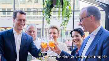 Kopfnicken und Bier: Wüst und Merz demonstrieren Einigkeit