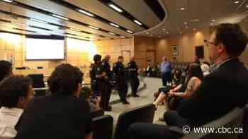 Police called, public barred from Regina city hall as councillors criticized over homelessness lawsuit