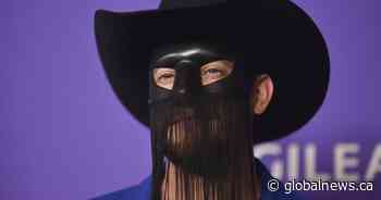 Country star Orville Peck postpones shows due to mental health