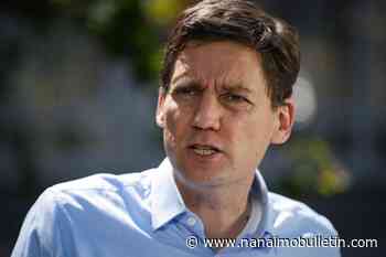 David Eby calls banners over B.C. highway ‘hateful’ and ‘reprehensible’