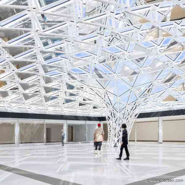 Studio Other Spaces encloses Buffalo museum courtyard in "canopy of glass and mirrors"