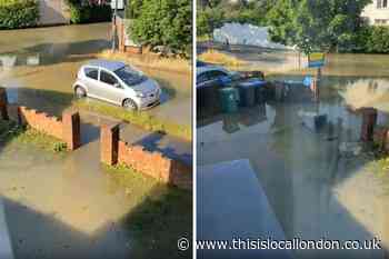 Images show road flooded after Preston Road burst main