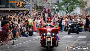 Large crowds pack Toronto streets as Canada's largest Pride parade begins
