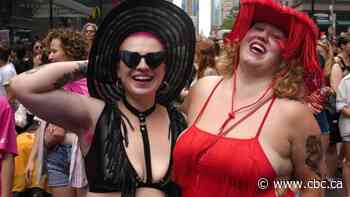 Large crowds pack Toronto streets as Canada's largest Pride parade begins