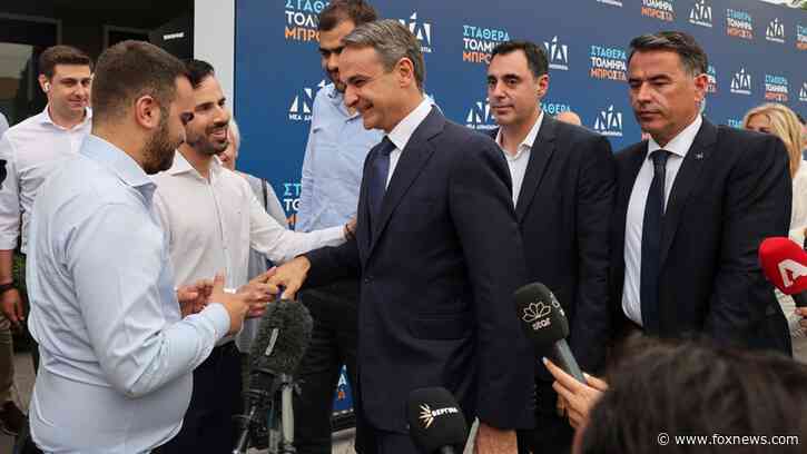 Greece’s conservatives win landslide victory in elections