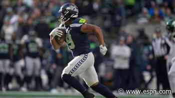 How will the Seahawks split carries in a stacked backfield?