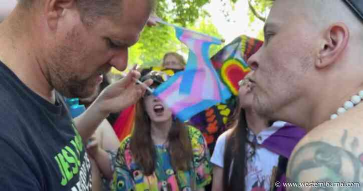 Spiritual Battle: 'Pride' Attendees Act Like Animals as They Surround Street Preacher