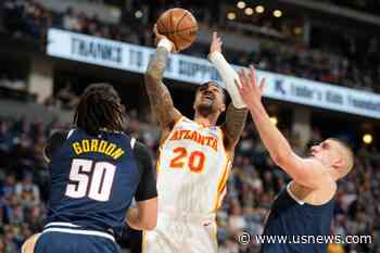 Hawks Clear Cap Room, Trade Collins to Jazz for Gay, Future 2nd Rounder, AP Source Says