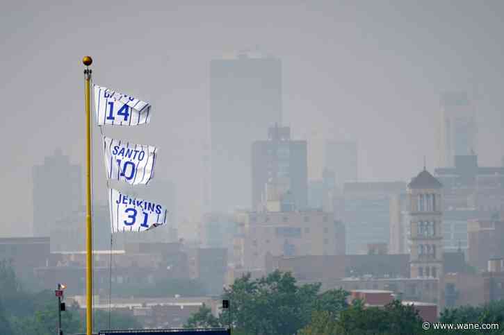 Haze over Great Lakes region reminds US residents that Canadian wildfires persist