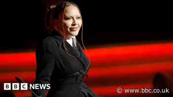 Madonna postpones tour after stay in intensive care