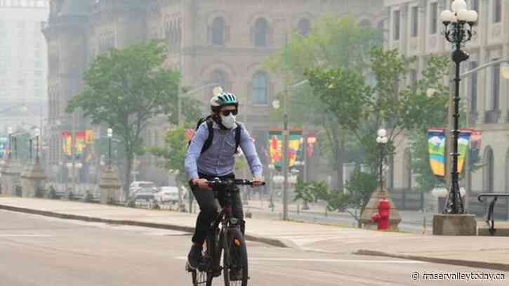 Canadian wildfires send smoke south, triggering air quality warnings