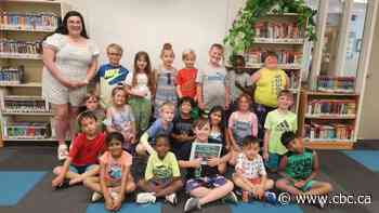 Elementary classroom publishes children's book about travelling the world