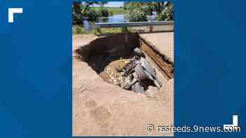 SUV falls into 6-foot-deep sinkhole