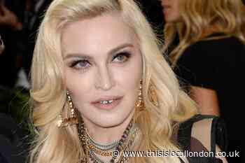 Madonna postpones world tour after intensive care stay