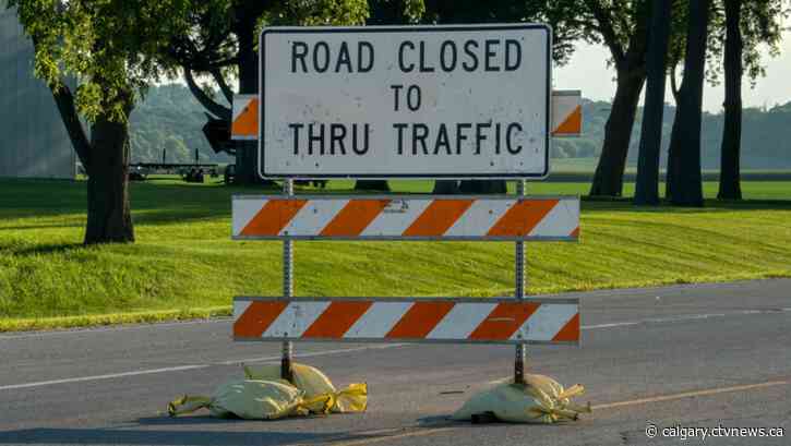 Police say driver charged in Whoop-Up Drive crash