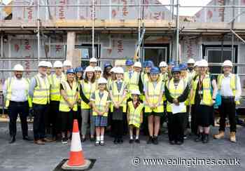 Topping-out ceremony marks progress on Ealing project