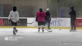 Blind hockey players hit the ice in Winnipeg