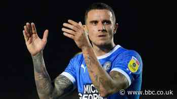 Ollie Norburn: Blackpool sign Peterborough midfielder