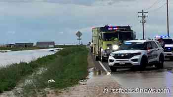 Man dies after car swept away in floodwaters