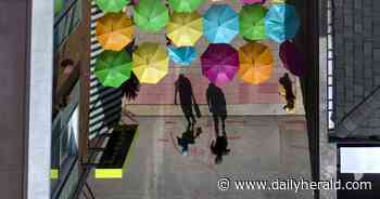 Suburban Skyview: 750 colorful umbrellas create Elmhurst open-air art installations