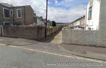 Accrington woman raped by male stranger in alleyway