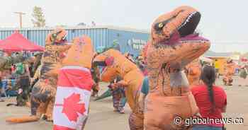 Dundurn celebrated Canada Day with large gathering of inflatable dinosaur costumes