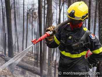 150 South Korean firefighters have arrived to help battle Quebec wildfires