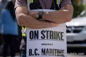 Union warns against Ottawa interfering in B.C. port workers strike as talks continue