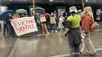 Live: Protesters gather outside the Reserve Bank of Australia ahead of interest rates decision, ASX steady