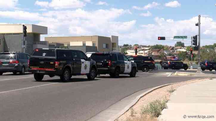 ABQ Police: Man ran over for 'brandishing' gun